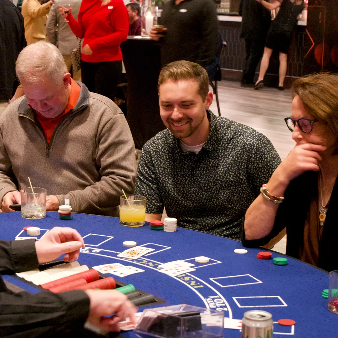 people playing black jack