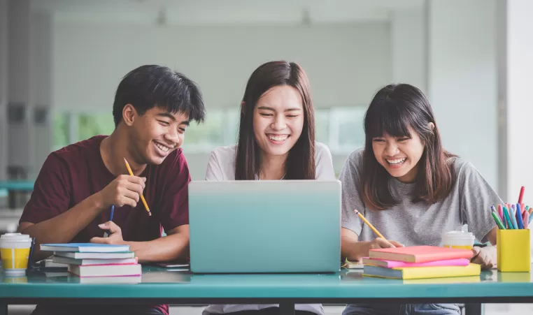 3 friends working on homework together