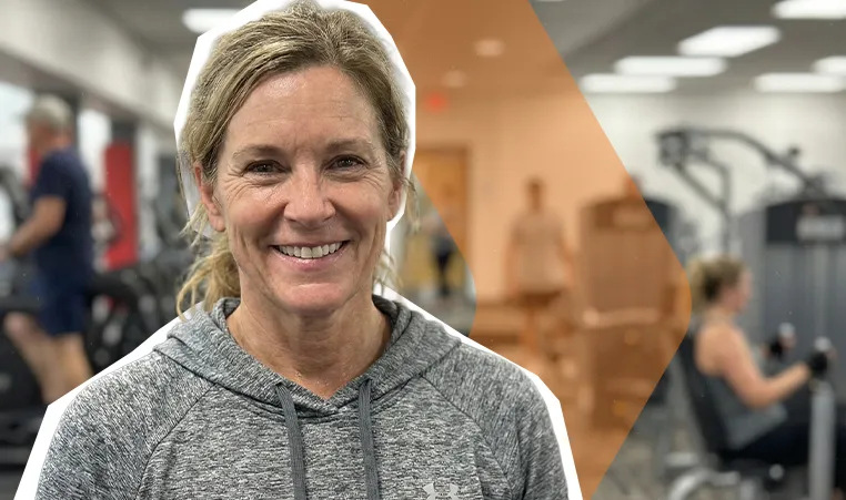 smiling woman in Marshall YMCA fitness center