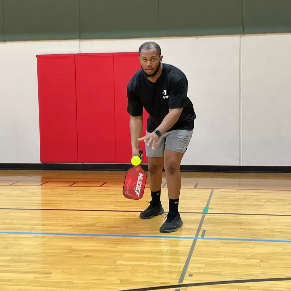 Man playing pickleball