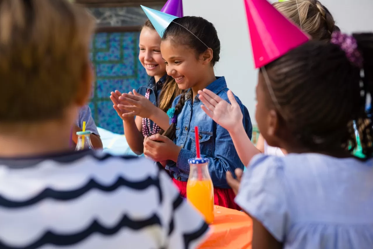 Group of happy children at a birthday party