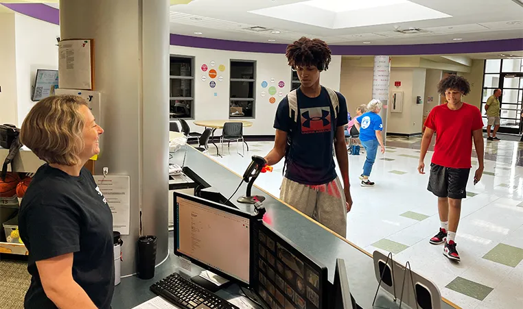 YMCA member checking in at the front desk
