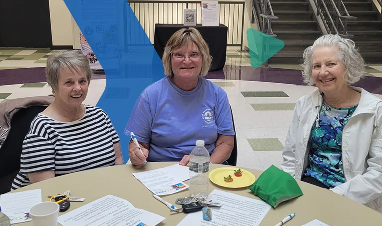 3 women sitting around a table at the YMCA