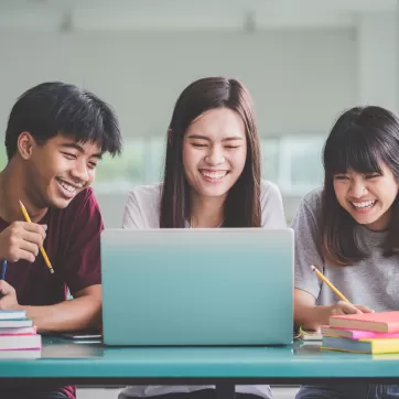3 friends working on homework together