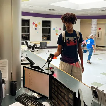 YMCA member checking in at the front desk