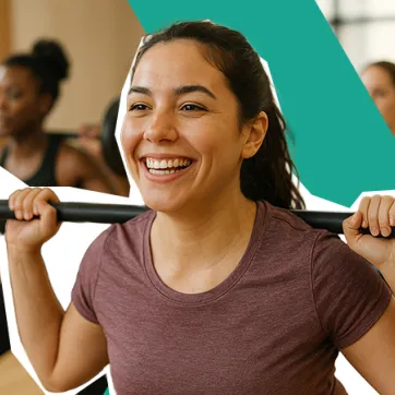 Woman smiling in a group exercise class