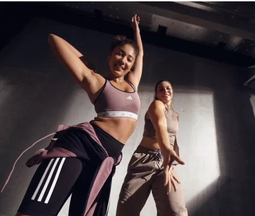 Two women doing a SH'BAM workout